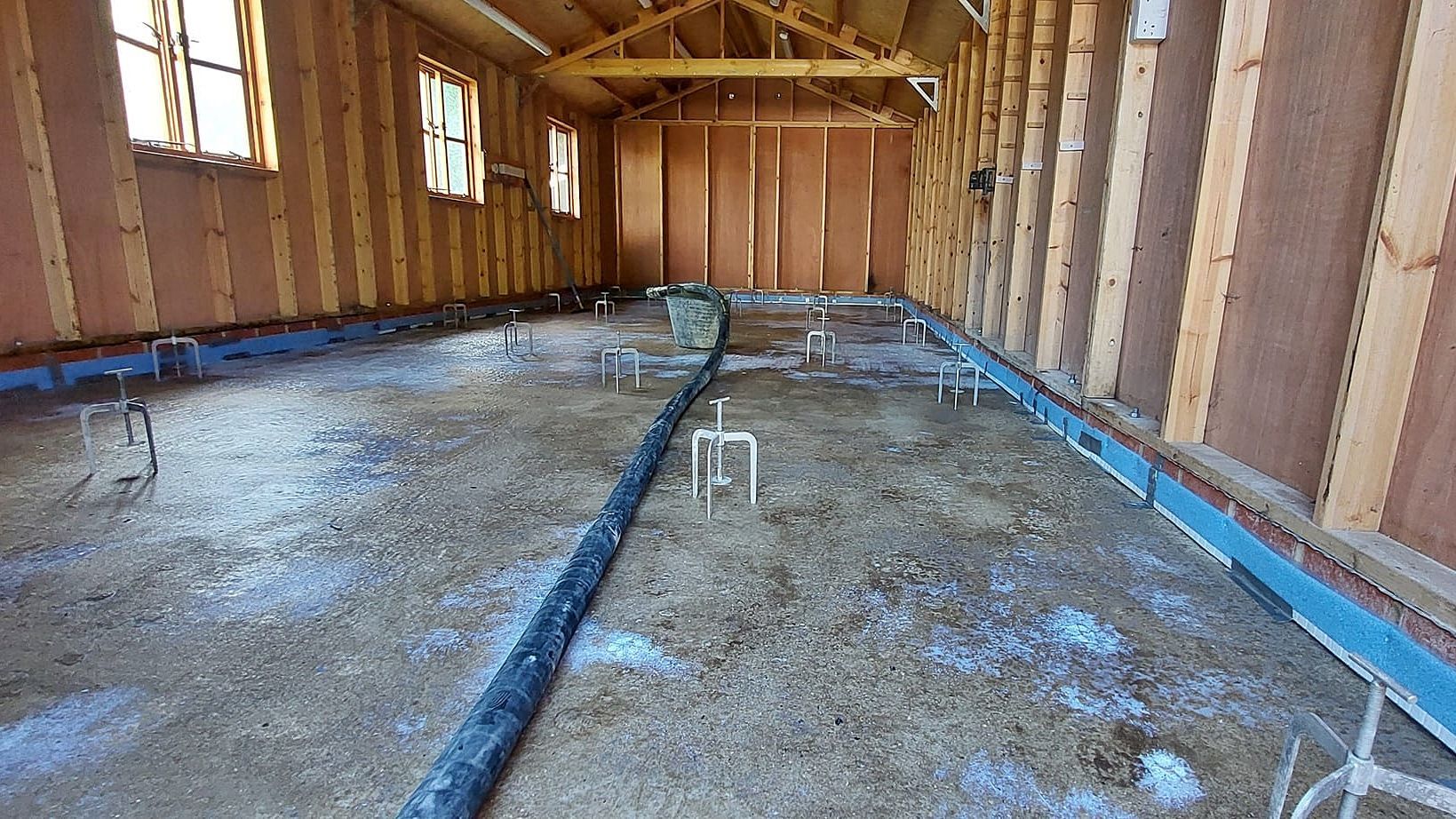 Images of Liquid flow screed preparation, delivery and installation, removing liquid flow screed laitance, pump hire, by JC Flow Screeds. Covering floors across East Anglia.
