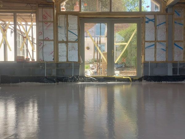 Images of Liquid flow screed preparation, delivery and installation, removing liquid flow screed laitance, pump hire, by JC Flow Screeds.