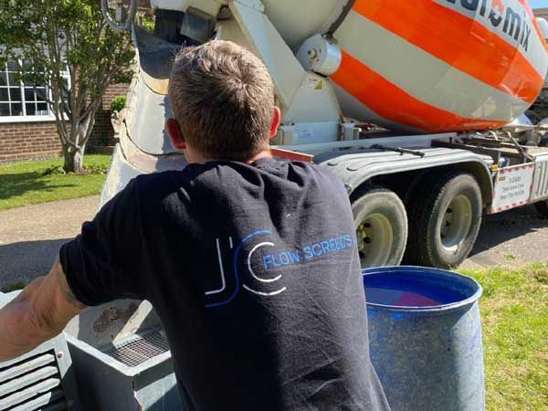 Images of Liquid flow screed preparation, delivery and installation, removing liquid flow screed laitance, pump hire, by JC Flow Screeds.