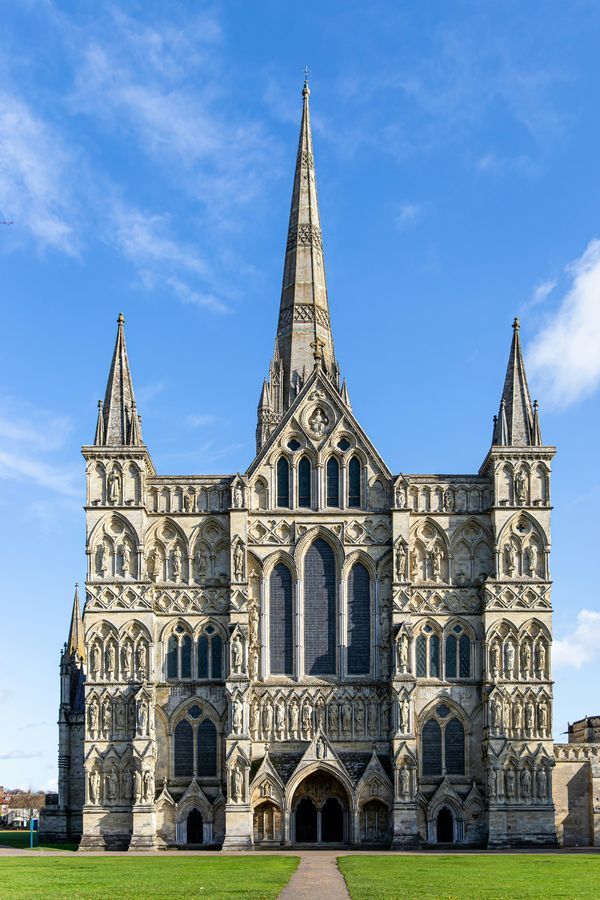 Salisbury Cathedral spire under a blue sky