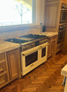 Kitchen with tile and hardwood flooring installation, DFW home renovation