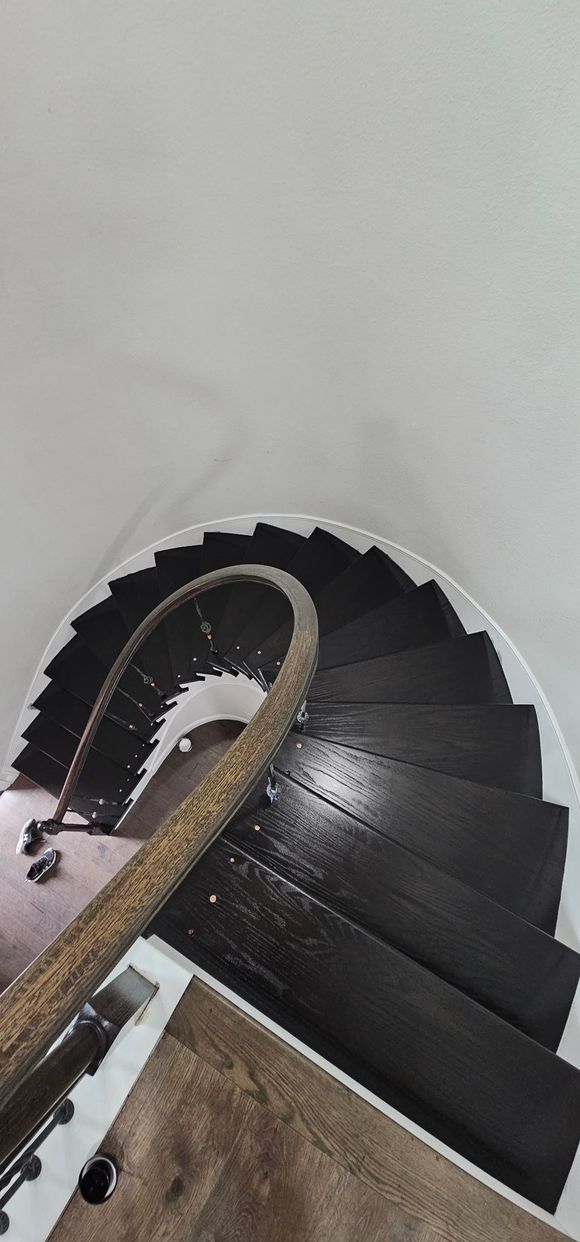 Custom hardwood staircase installation by Floor Genius, North Texas