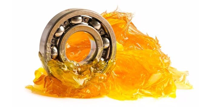 Bearing sitting in a large amount of grease