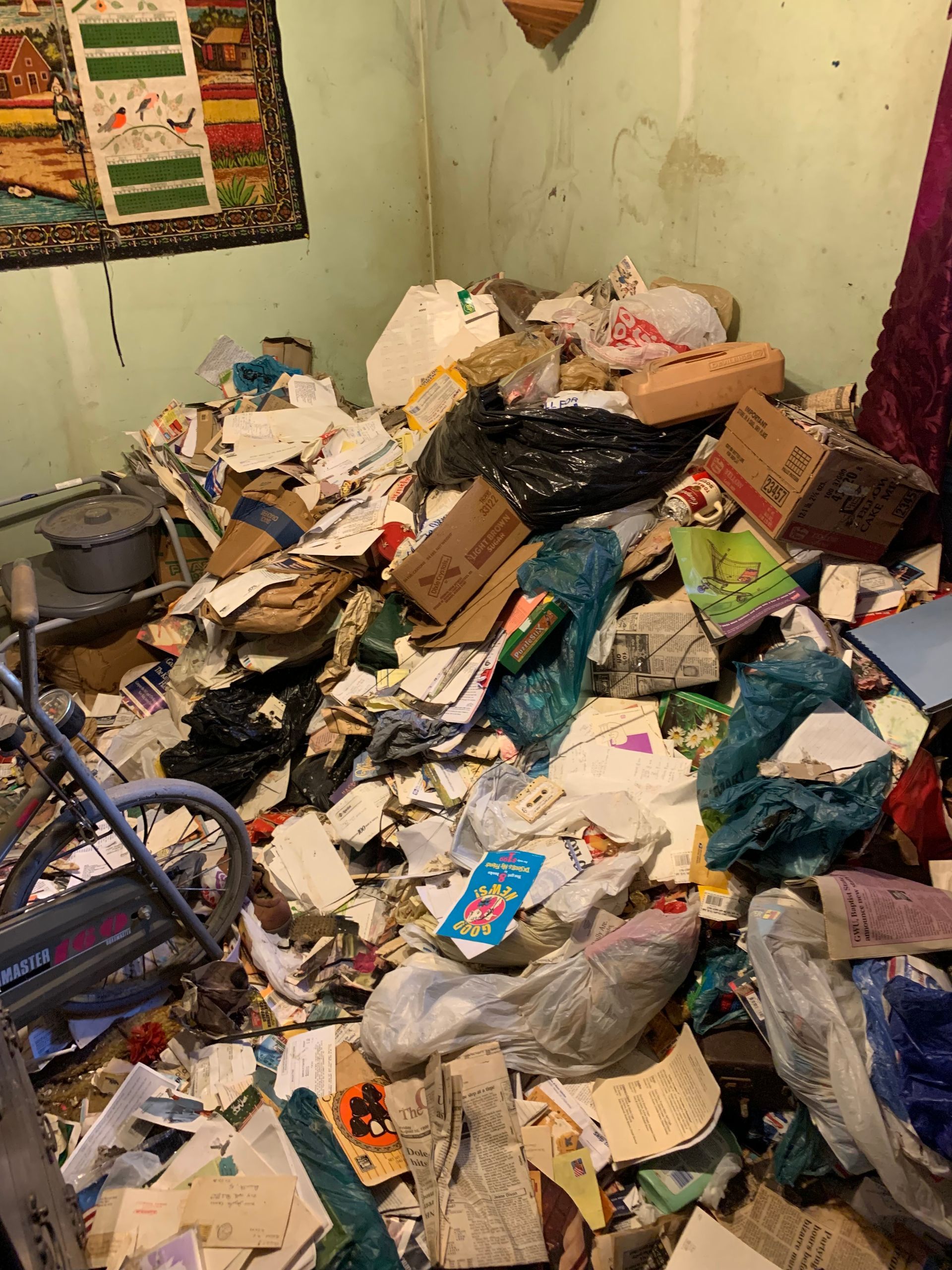 A room filled with lots of trash and junk.