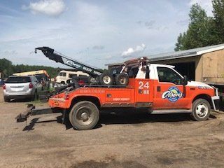Tow Truck — Keewatin, MN — Olson's Body Shop & Salvage, Inc. Tow Truck — Keewatin, MN — Olson's Body Shop & Salvage, Inc.