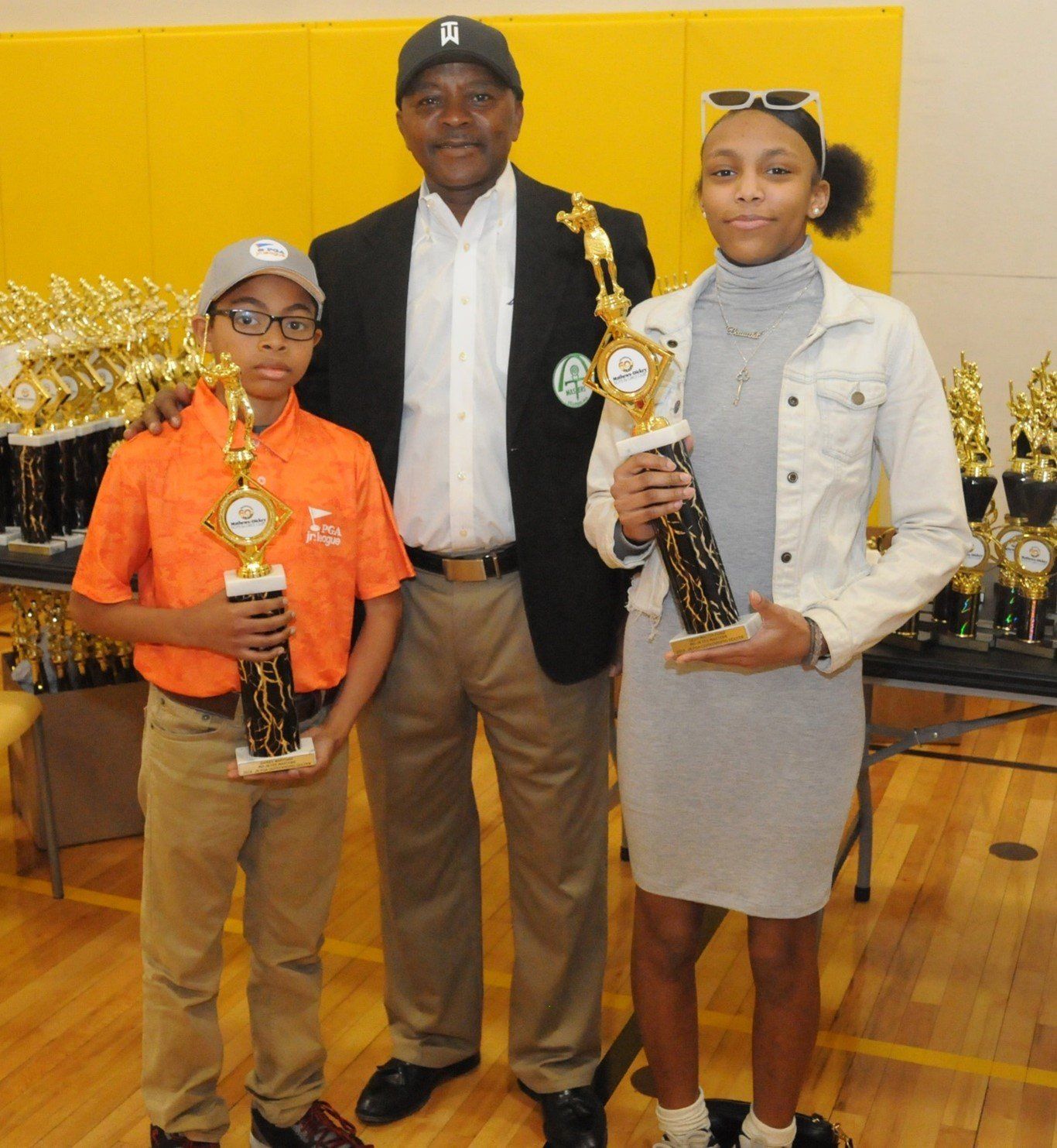 Kids Holding Trophy | St. Louis, MO | Tee Masters Golf Club of St. Louis Kids Holding Trophy | St. Louis, MO | Tee Masters Golf Club of St. Louis