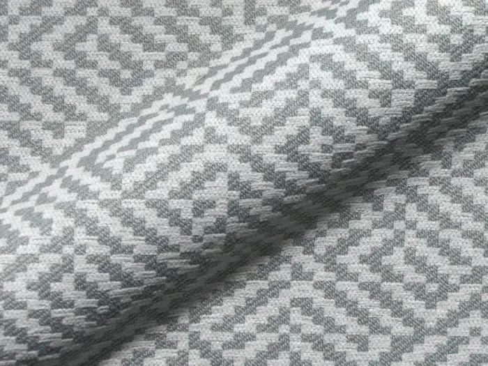 Een close-up van een stuk stof met een patroon erop