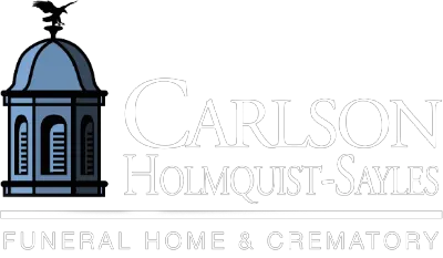 Logo for Carlson Holmquist-Sayles Funeral Home & Crematory featuring a blue cupola icon with an eagle weather vane.