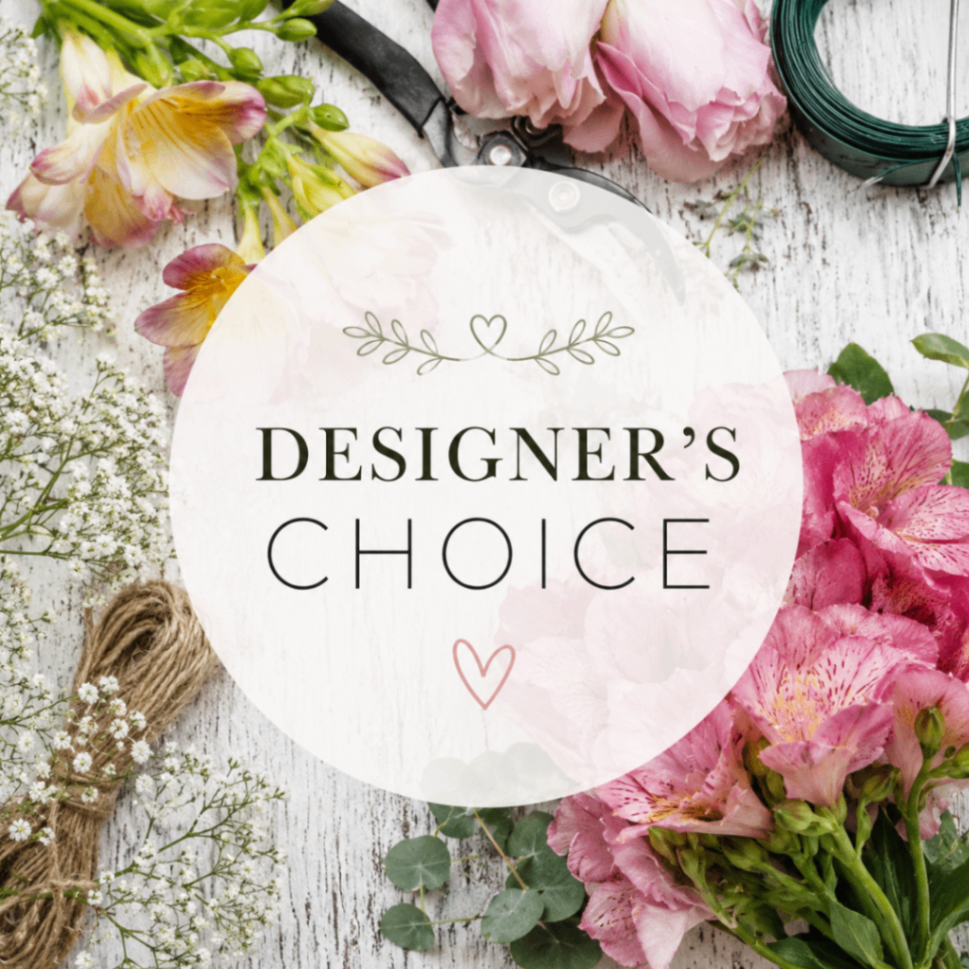 Floral “Designer’s Choice” sign on a white circle with pink and green flowers around it