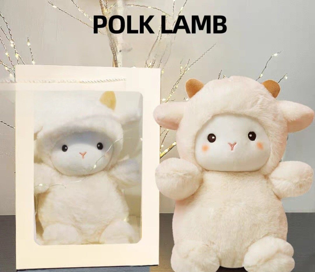 Two fluffy white lamb plush toys, one in a frame and one standing beside it, with “POLK LAMB” text above.