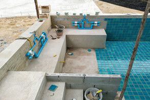 pool contractor repairing a broken pool
