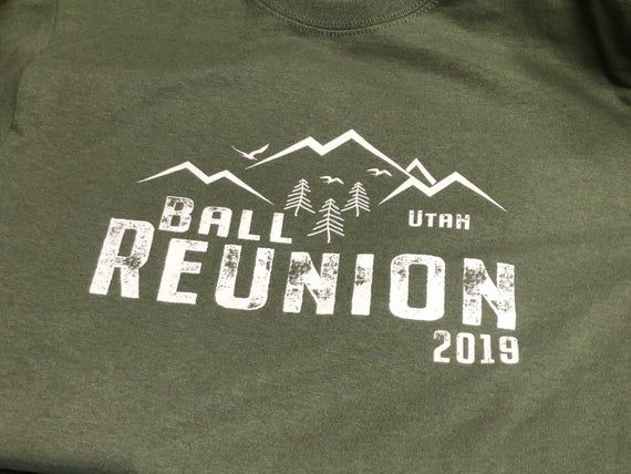 Olive green shirt with white “Bali Reunion Utah 2019” text and mountain graphic