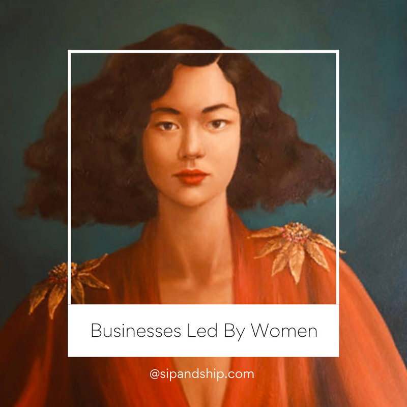 Portrait of a woman in an orange dress with the text “Businesses Led By Women”