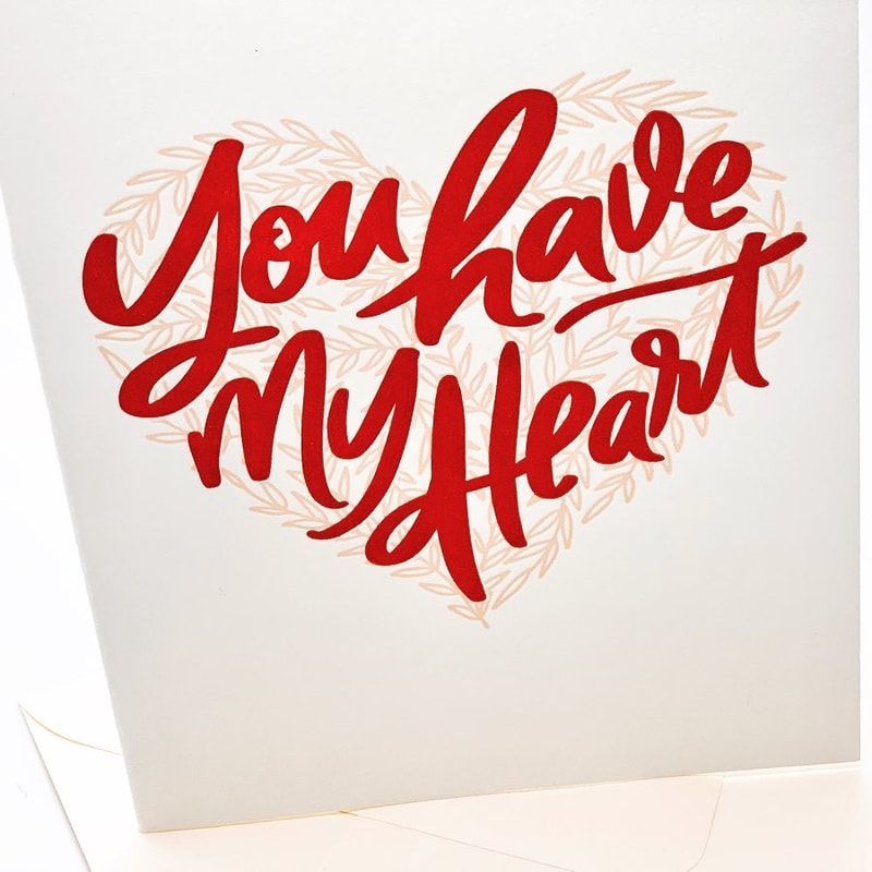Red hand-lettered “You have my heart” over a faint heart outline on a white card