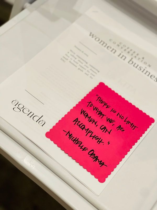 Open magazine page with a bright pink sticky note and handwritten message.