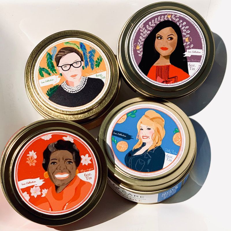 Four illustrated candle tins with colorful portrait labels on a white surface