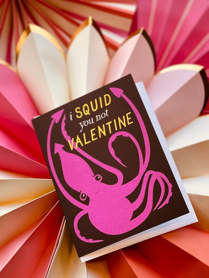 Pink octopus Valentine card reading “I squid you not Valentine” on layered paper flowers