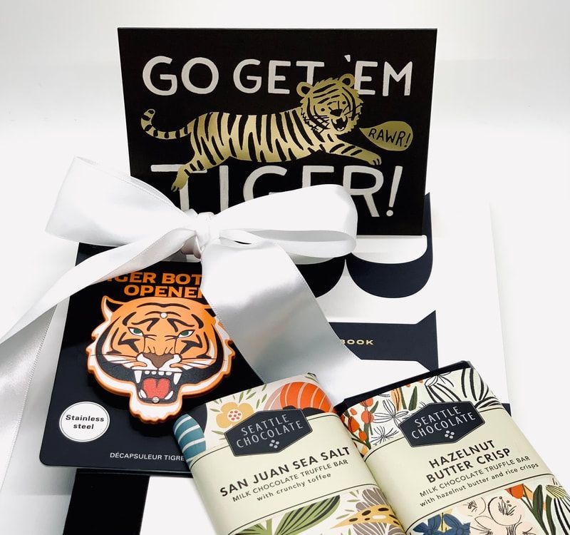 Tiger-themed gift set with novelty cards and snack bags on a white background