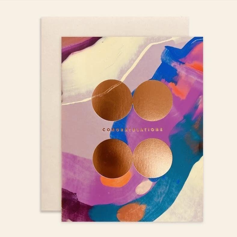 Abstract poster with four copper circles over purple, blue, and pink brushstrokes