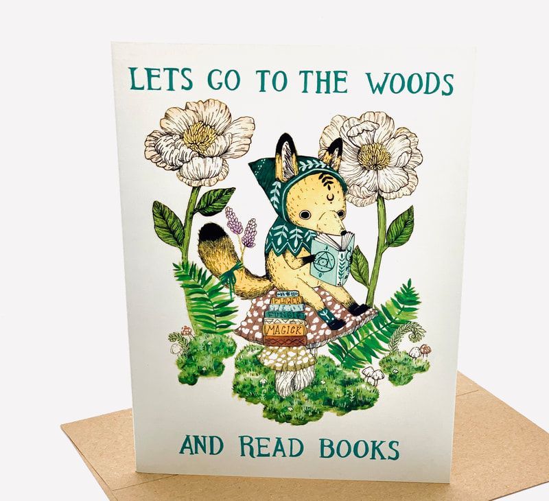 Card with fox reading in a floral woodland scene, text says “Let’s go to the woods and read books.”