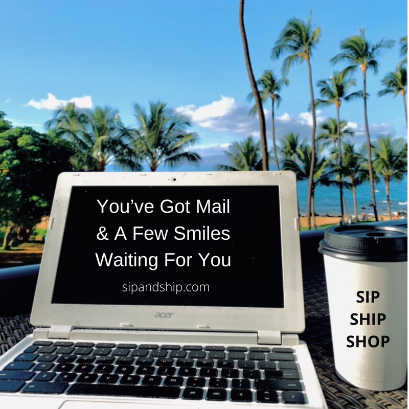 Laptop on tropical beach with text, “You’ve Got Mail & A Few Smiles Waiting For You,” and a coffee cup beside it