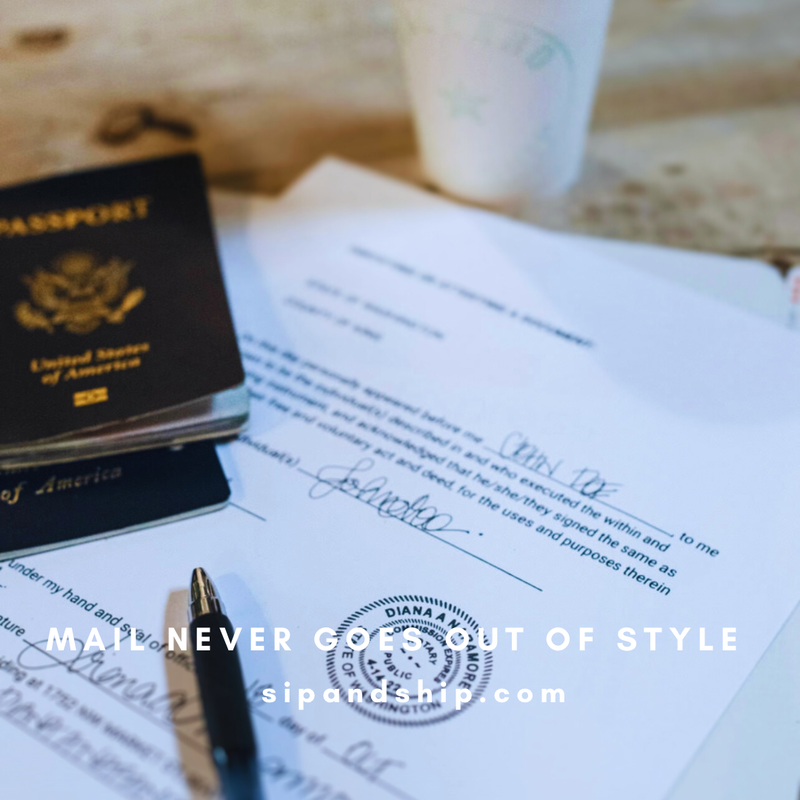 Passport, documents, and a cup on a table with a “never goes out of style” caption.