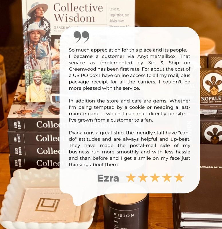 Stack of “Collective Wisdom” books beside a white review card with 5 gold stars on a wooden counter