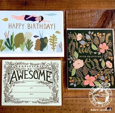 Three handmade cards on a wooden surface: birthday, awesome certificate, and grateful floral thank-you card.