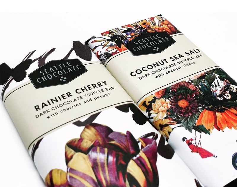 Two Seattle Chocolate bar wrappers: Rainier Cherry and Coconut Sea Salt with colorful floral designs