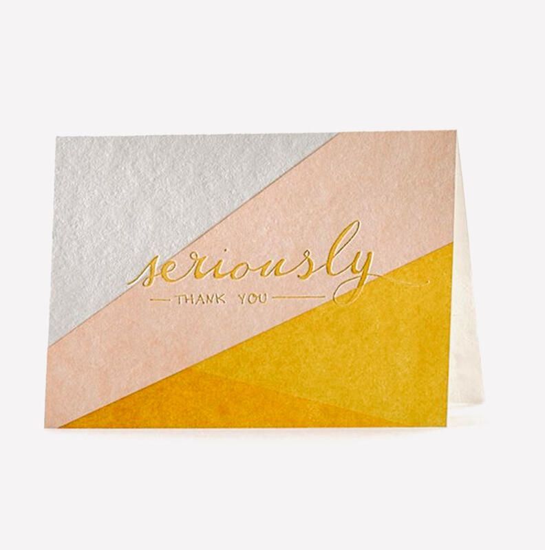Elegant thank-you card with “seriously thank you” in gold script on white and peach geometric background