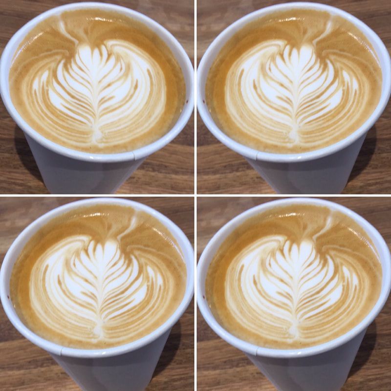 Four cups of latte with heart-shaped foam art, arranged in a 2x2 grid.