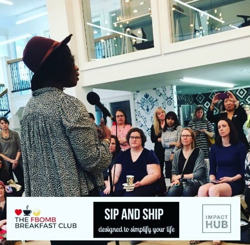 Speaker addresses a seated audience at a brunch event with banners reading “The Fromm Breakfast Club” and “SIP AND SHIP.”