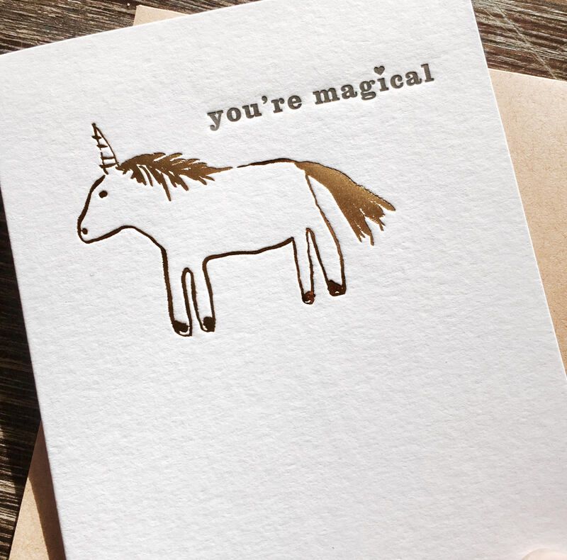 Card with a hand-drawn unicorn and the words “you’re magical” on a white background