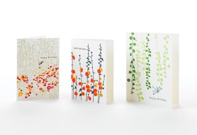 Three floral greeting cards with watercolor blossoms in pink, orange, and green on white backgrounds