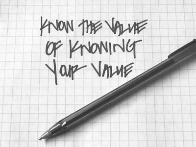 Handwritten quote on graph paper beside a black pen: “Know the value of knowing your value.”