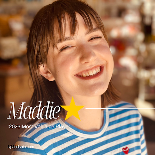 Smiling person in a blue-and-white striped shirt, with “Maddie” and a yellow star overlay.