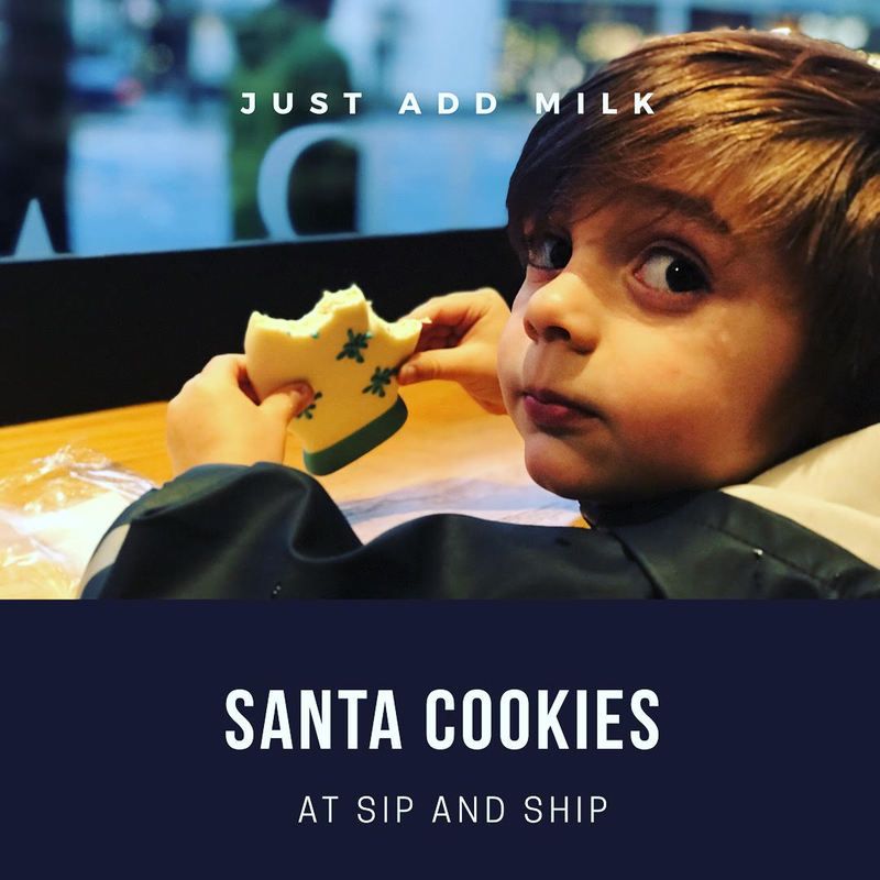 Child holds a star cookie at a table, with the text “Santa Cookies” and “Just Add Milk.”