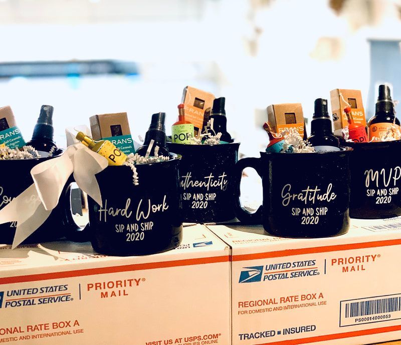 Gift baskets with wine and snacks labeled for work, gratitude, and MVP, on USPS Priority Mail boxes.