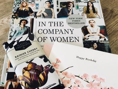 Book collage with fashion magazine covers, including 