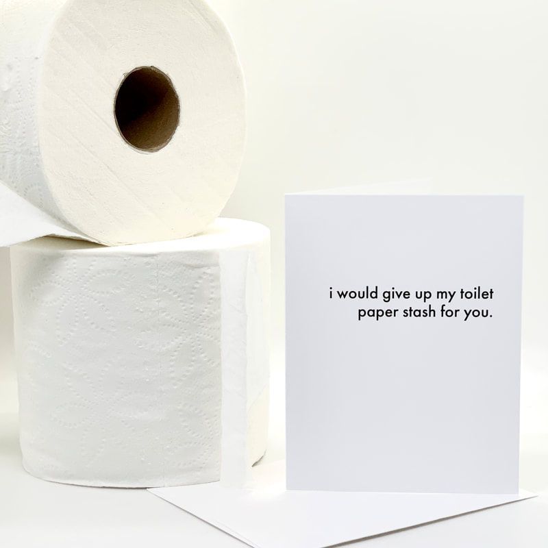 Two white toilet paper rolls beside a card reading, “I would give up my toilet paper stash for you.”