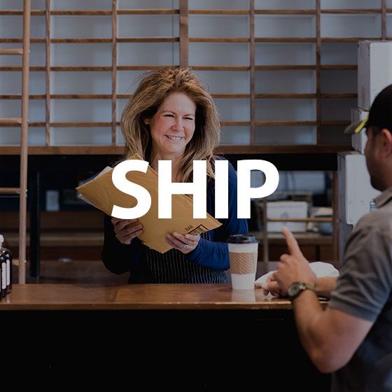 Smiling cashier hands a package across a counter with “SHIP” overlaid in bold white text