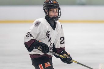 Henderson Warriors player in the white jersey during a game