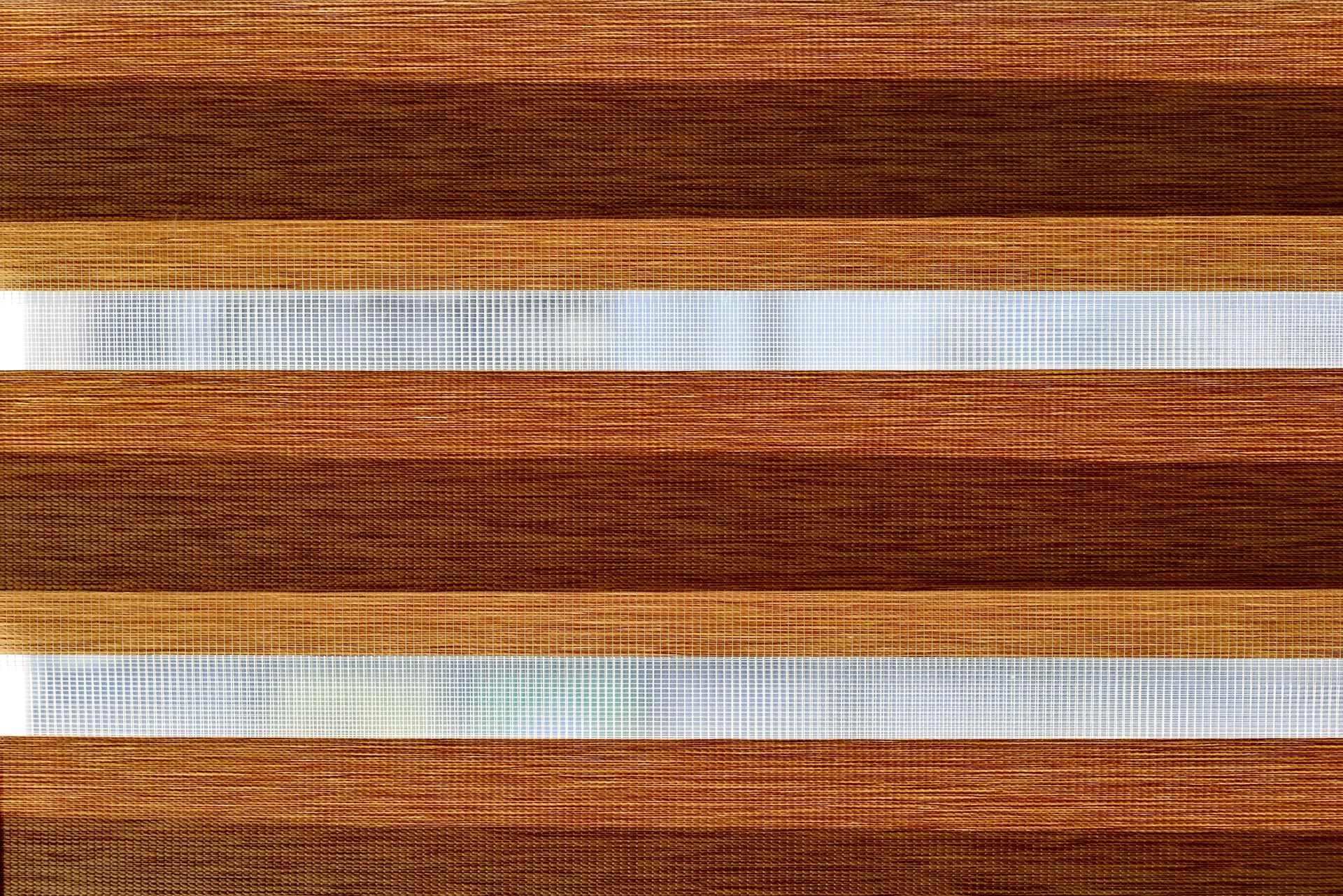 Abstract wood-grain texture with two horizontal white bands across a brown surface Abstract wood-grain texture with two horizontal white bands across a brown surface