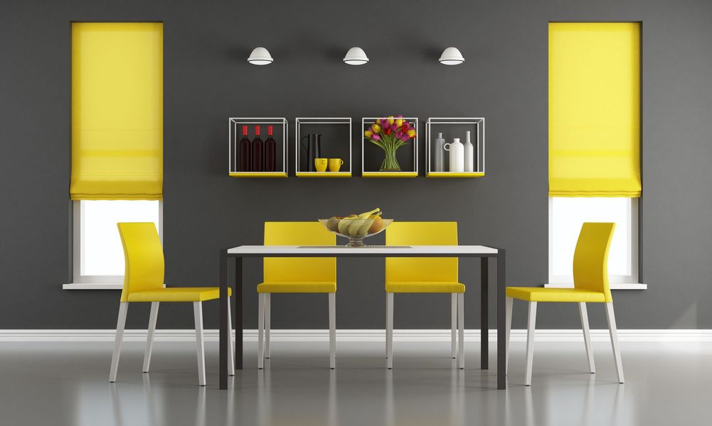 Modern dining room with yellow chairs, gray table, black wall, and bright yellow window shades Modern dining room with yellow chairs, gray table, black wall, and bright yellow window shades