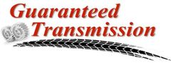 Guaranteed Transmission logo with red text and a black tire track swoosh