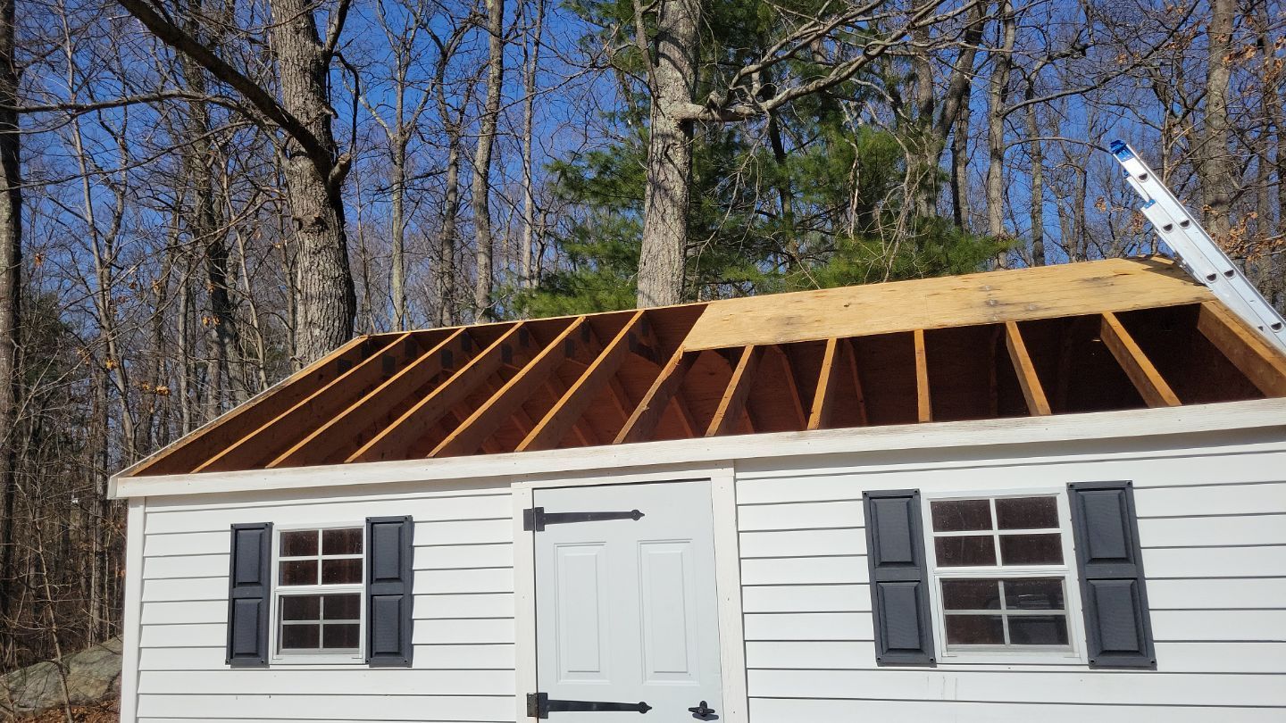 Shed with sheathing removed.