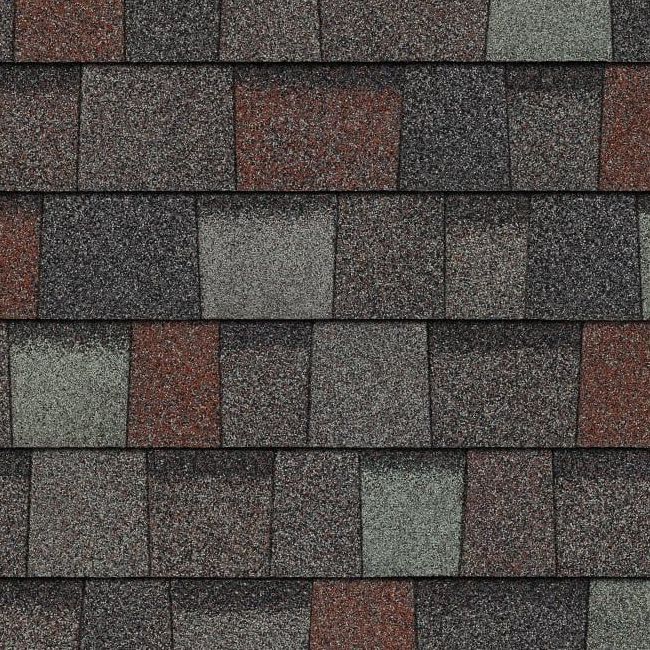 A close up of a row of shingles on a roof.
