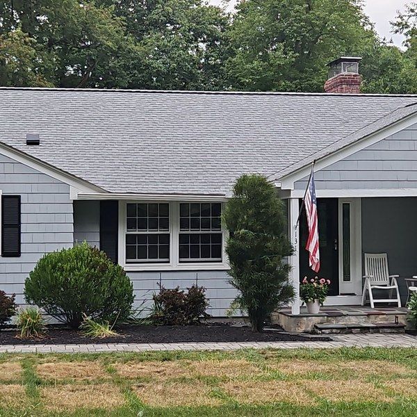 Completed GAF Timberline HDZ shingle roof on a 1956 ranch home in Fitchburg MA