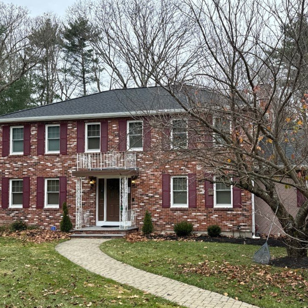 colonial style home with new roof