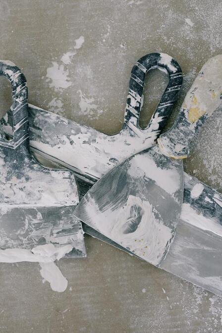 stucco tools in a pile after a jon in mesa az